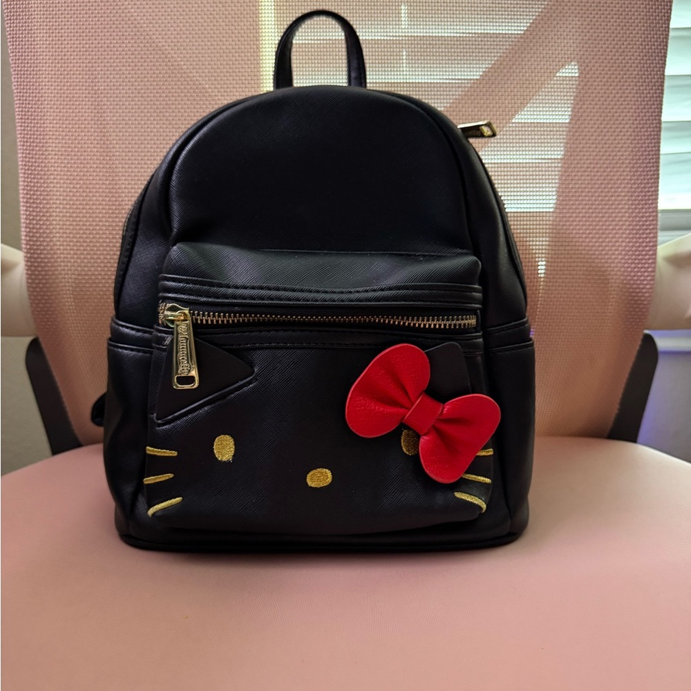 Loungefly x ModCloth Hello Kitty Black Backpack with Red Bow